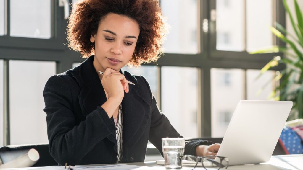 Portrait of a woman analyzing a business report