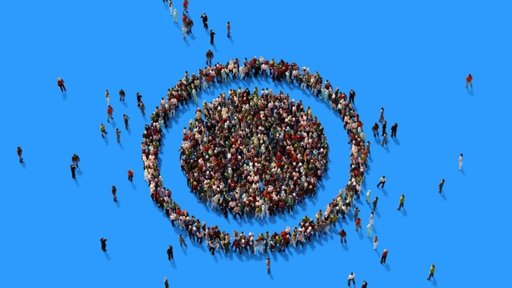 Human Crowd Forming A Target Symbol: Target Market Concept