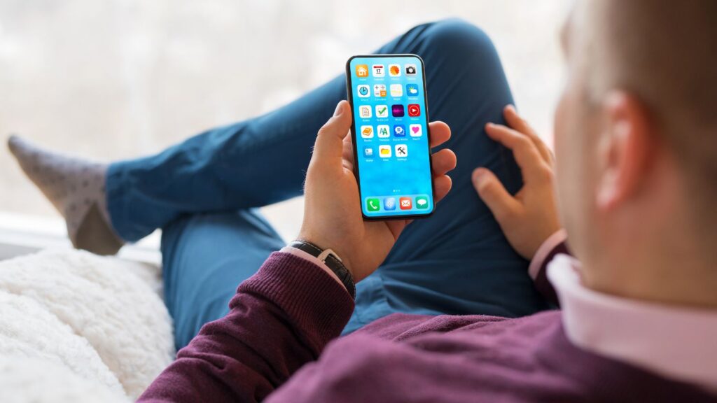 A man browsing on his mobile phone