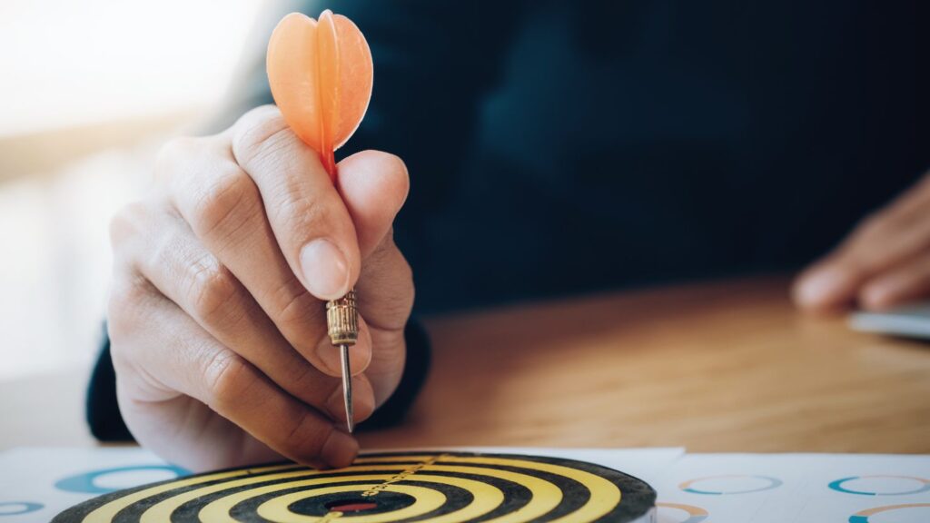 Business Strategy Planning Success Target Goals symbollized by a dart hitting the bull's eye